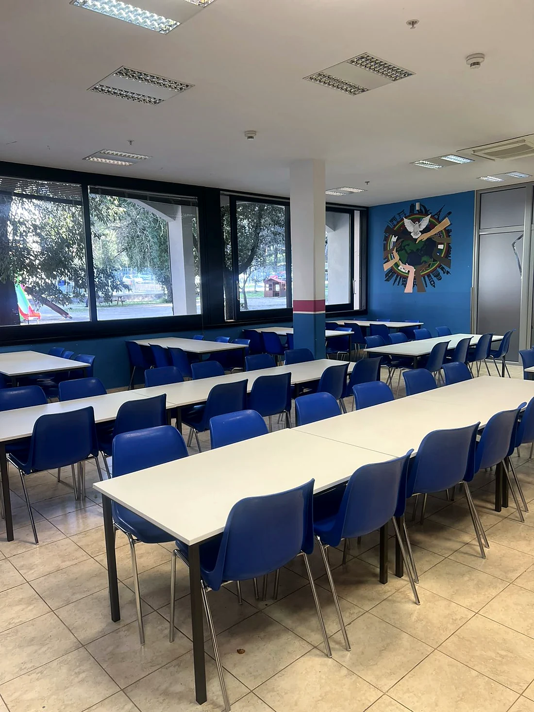 Shared room with tables and chairs at KSI Montenegro.